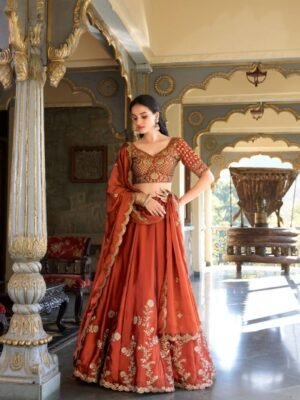 Orange color Rangoli Silk Lehenga with Sequins & Thread Embroidery