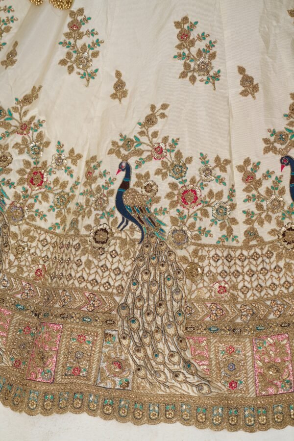 White Zari Silk Bridal Lehenga with Intricate Peacock Embroidery – Pink Dupatta Wedding Ensemble - Image 3